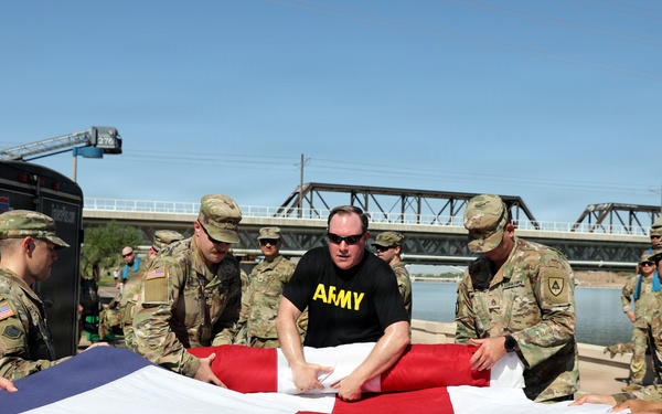 Soldiers roll flag at 9/11 memorial run