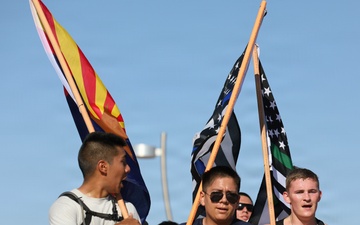 Flag-bearing runners participate in Tunnel to Towers 9/11 memorial run