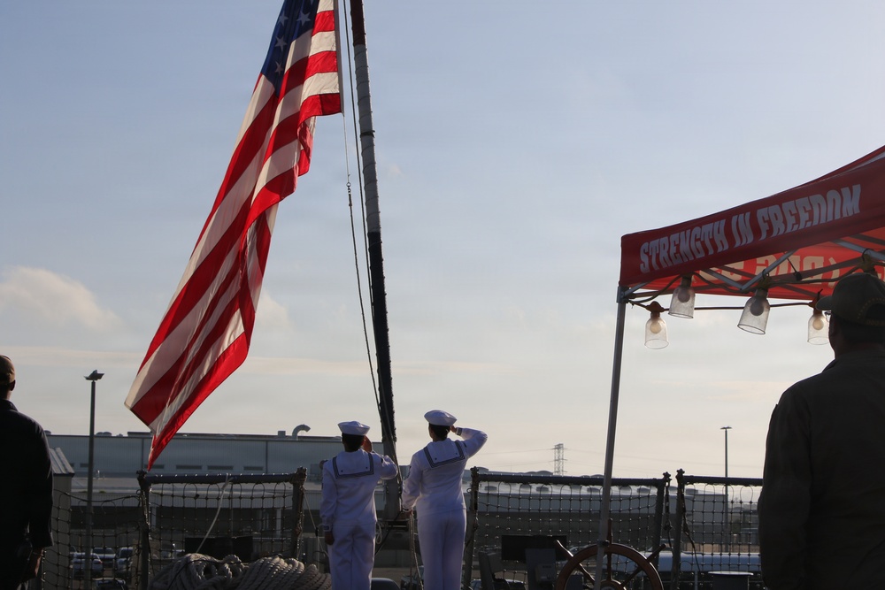 U.S. Navy Sailors Render Honors During Colors Ceremony during 9/11 Remembrance Day