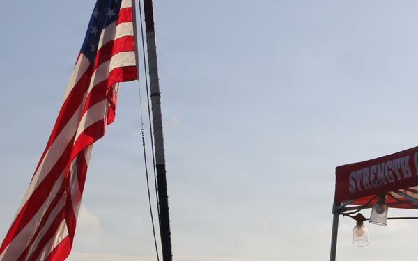 U.S. Navy Sailors Render Honors During Colors Ceremony during 9/11 Remembrance Day