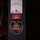 C7F Band Participates in American Sound in Japan The image shows a dark surface, likely a music stand or equipment case, with three stickers/labels affixed to it. The labels represent different musical organizations: the Mozarteum Orchester Salzburg, the Gewandhaus Orchester, and the U.S. 7th Fleet Band. A handwritten date '5. 2006' is visible on the Mozarteum label.