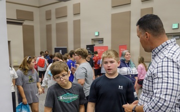 Speaking with Students at a Career Fair