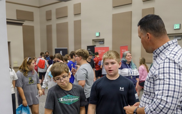Speaking with Students at a Career Fair