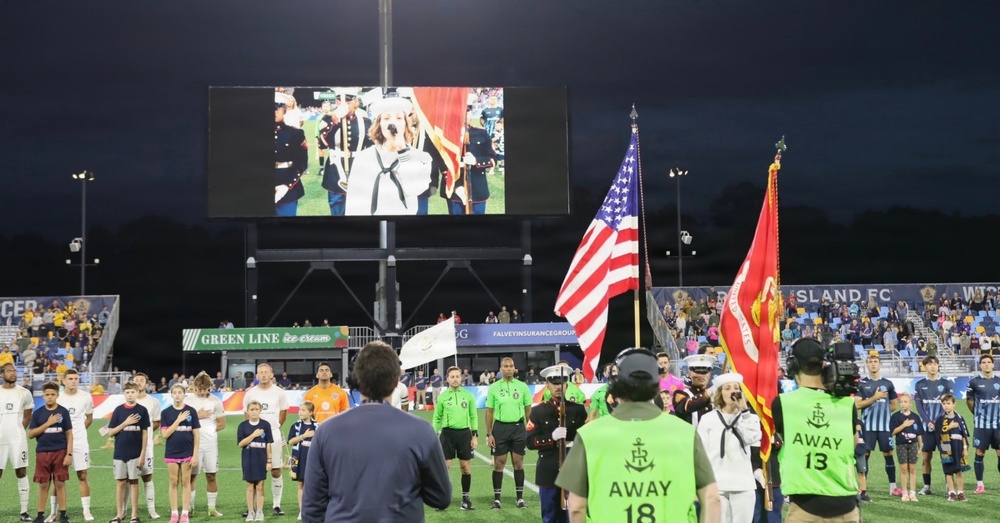 Navy Band Northeast Vocalist MU3 Tamra Martinez Sings the National Anthem before Kickoff at the Rhode Island FC game during Military Appreciation Night