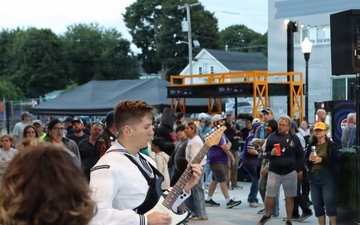 MU2 Christian Olver, member of Navy Band Northeast's Rhode Island Sound, performs for the Rhode Island FC pre-game show  on military appreciation night at Centerville Bank Stadium in Pawtucket, RI