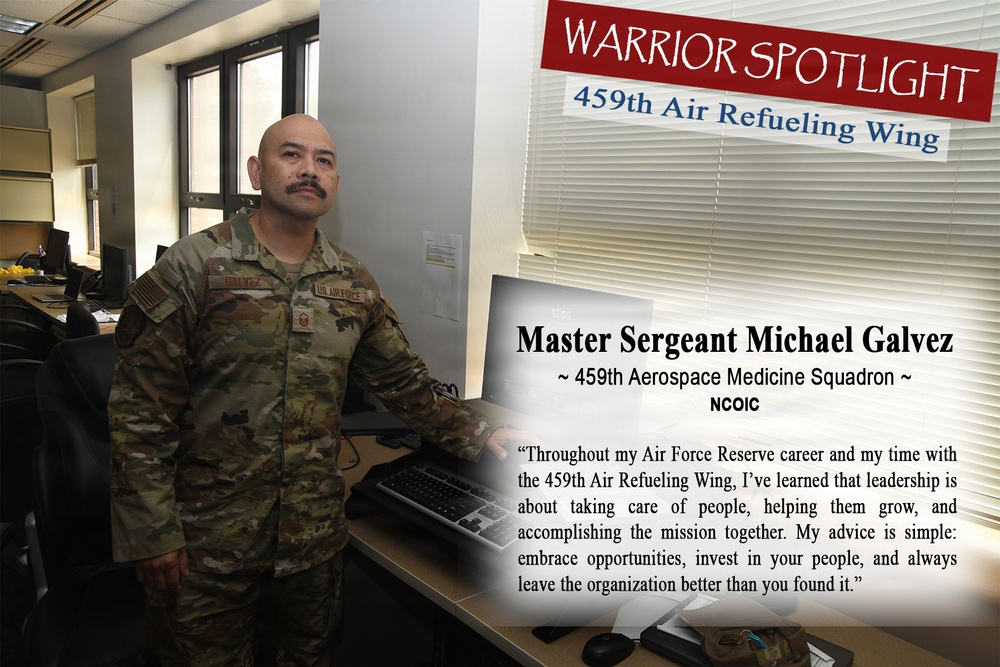 This is a 'Warrior Spotlight' promotional graphic featuring Master Sergeant Michael Galvez of the 459th Aerospace Medicine Squadron, 459th Air Refueling Wing, U.S. Air Force Reserve. He is photographed in an office environment wearing OCP (Operational Camouflage Pattern) uniform, standing near a computer workstation. The graphic includes a motivational quote about leadership and a title identifying his role as NCOIC.