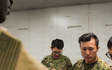 Japanese and U.S. Service Members Discuss Operations During Exercise Orient Shield