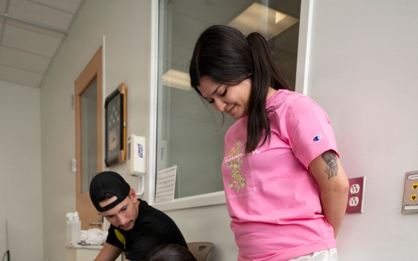 Finding Her Stride: Injured Airman Channels Grit, Military Medicine to Return to Duty