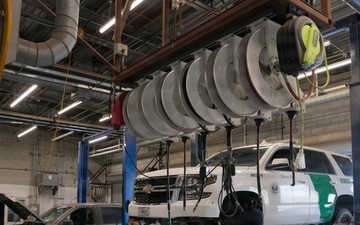 Border Patrol Vehicles at repair facility