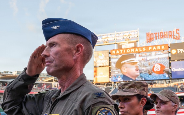 316th Wing leadership throws 1st pitch at Nationals baseball game