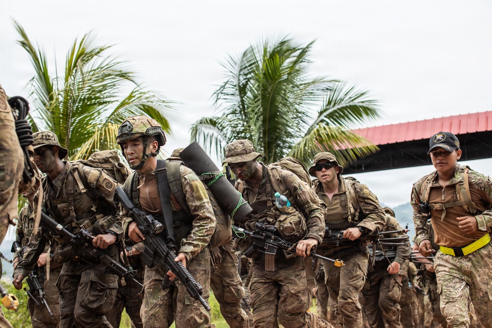 Multinational Soldiers return to Jungle School from field training exercise, SV26