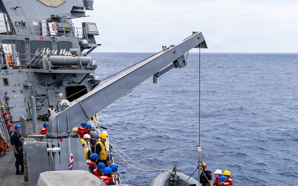 USS Mustin conducts boat operations