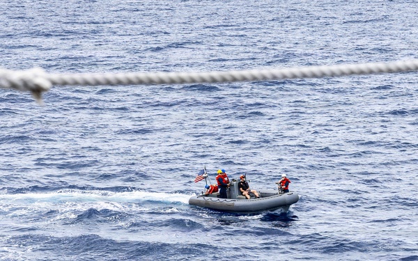 USS Mustin conducts boat operations