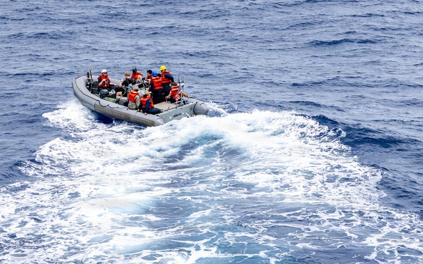 USS Mustin conducts boat operations