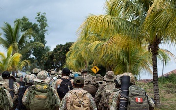 Multinational Soldiers return to Jungle School from field training exercise, SV26