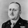A formal black-and-white military portrait photograph of a middle-aged male U.S. Army officer. He is wearing a dress uniform with multiple medal ribbons, rank insignia, and a Combat Infantryman Badge. The photo bears an archival number '289786' in the lower right corner.
