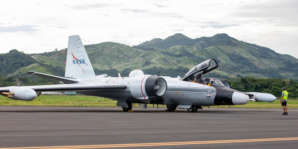 NASA pilots and Panamanian flight students tour a WB-57F aircraft after a flight exercise