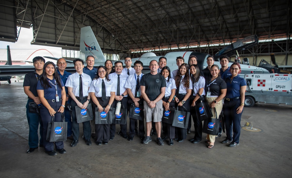 NASA pilots and Panamanian flight students tour a WB-57F aircraft after a flight exercise