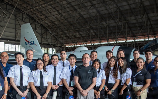 NASA pilots and Panamanian flight students tour a WB-57F aircraft after a flight exercise