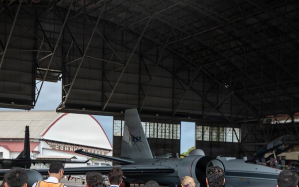 NASA pilots and Panamanian flight students tour a WB-57F aircraft after a flight exercise