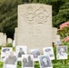 A Commonwealth War Graves Commission headstone commemorates airmen of the 1939-1945 War, specifically crew members of Stirling BK716, Royal Air Force, who died on 29th-30th March 1943. The stone bears both the Royal Air Force and Royal Canadian Air Force emblems, indicating a mixed-nationality crew. Multiple black-and-white portrait photographs of the airmen have been placed at the base of the headstone as a memorial tribute.