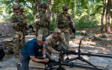 Retired SMA Grinston talks with Soldiers competing for Expert Soldier Badge