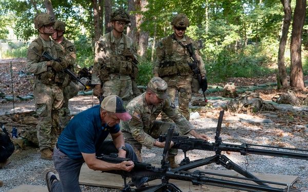Retired SMA Grinston talks with Soldiers competing for Expert Soldier Badge