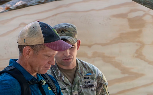 Retired SMA Grinston speaks with Soldiers competing for Expert Soldier Badge