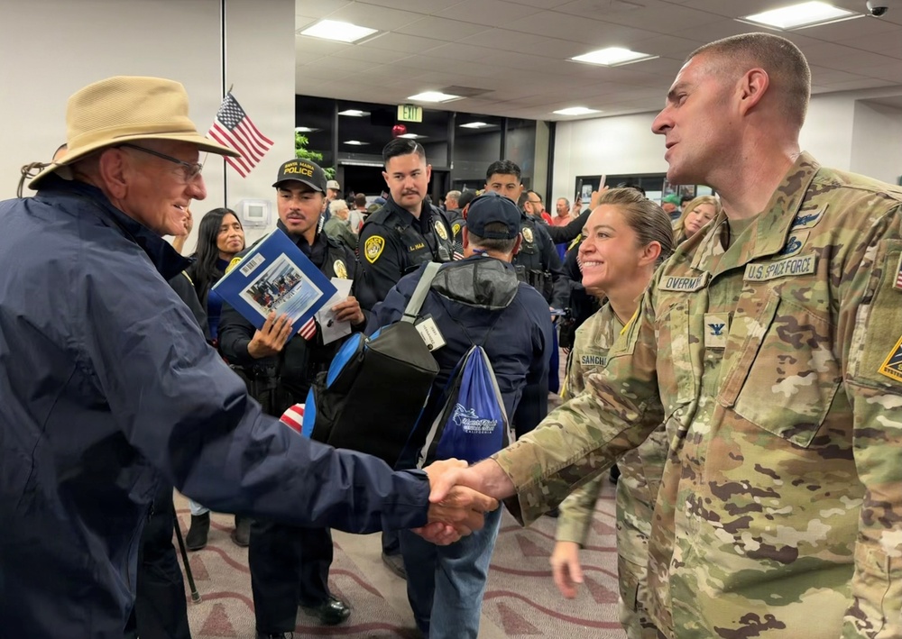 Team V welcomes home Honor Flight veterans