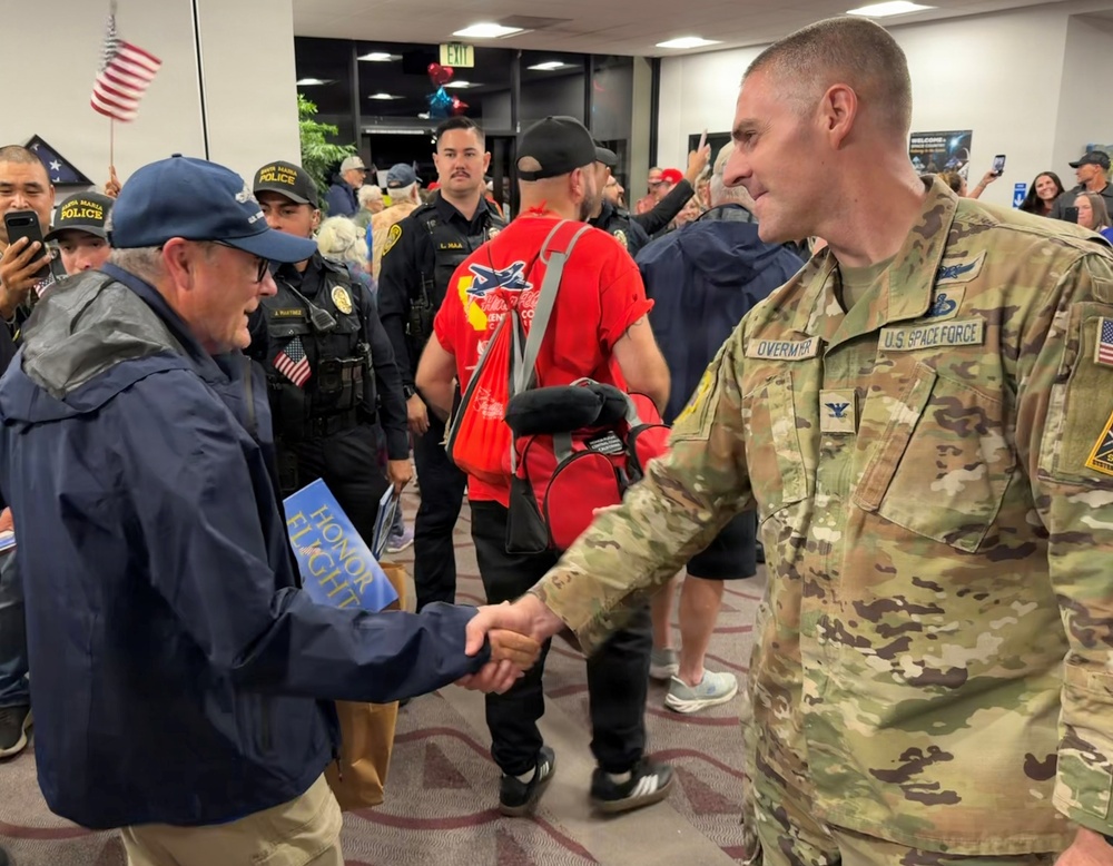 Team V welcomes home Honor Flight veterans